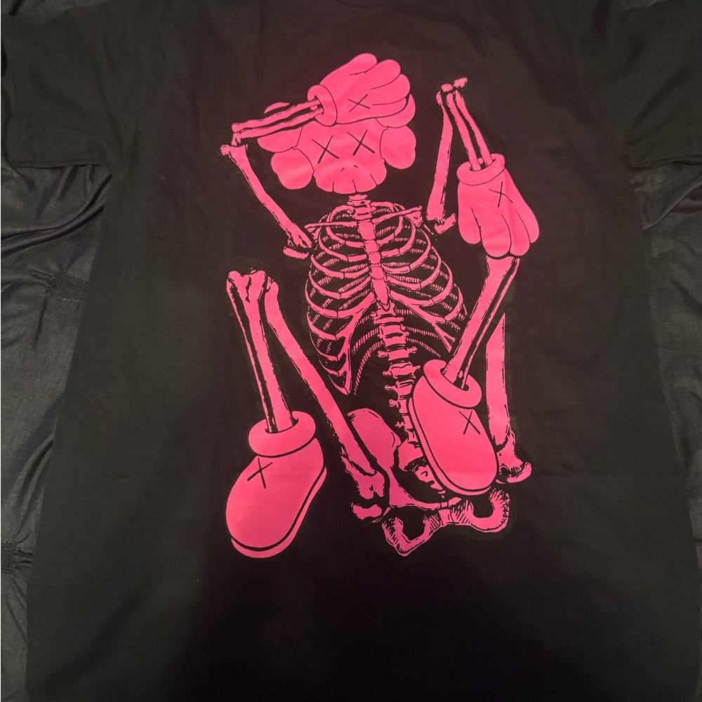 KAWS Black Tee with Pink Skeleton Design